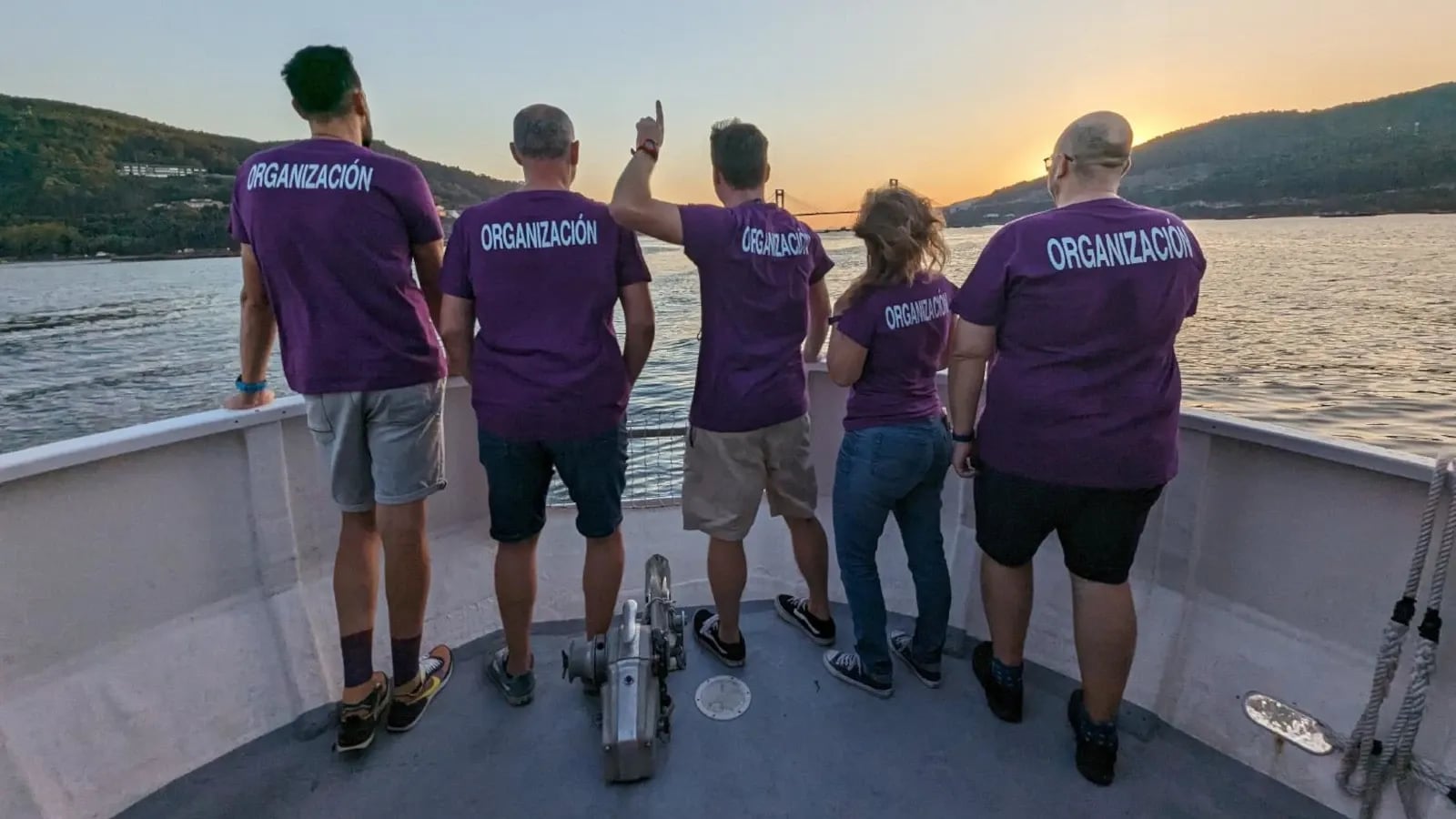 Event organization team returning by boat from the island at the end of the event.